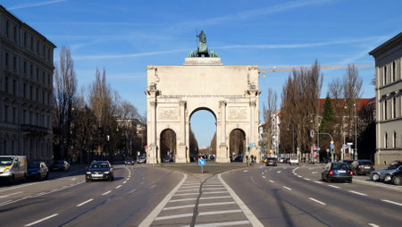 Munich, Germany - December 26, 2015: Siegestor, famous 19th-century triumphal arch featuring a bronze sculpture of Bavaria with 4 lions, southern facadeのeditorial素材