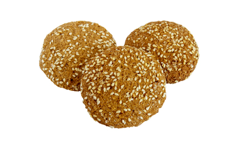 Oatmeal cookies sprinkled with sesame isolated on white backgroundの写真素材