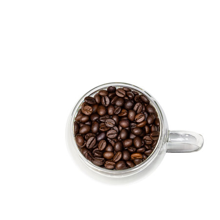 Glass coffee cup with coffee beans, top view on a white background. Isolated on a square image