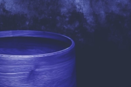 Dark and moody blueberry abstract background with low key lighting for design and creative projectsの素材