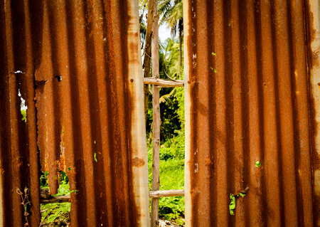 Old rusty of zinc sheet  fence is grunge  background.の写真素材