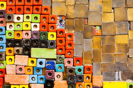 Colorful bricks decorate on the beautiful wall.