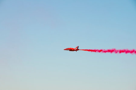 Acrobatic flying planes in air showの写真素材