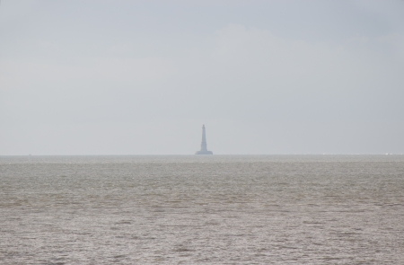 Famous french  Cordouan  lighthouse in the sea during the fog の写真素材