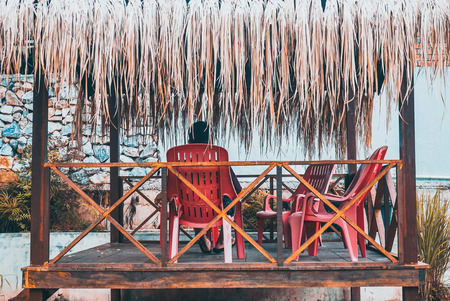 Man resting under the hutの写真素材