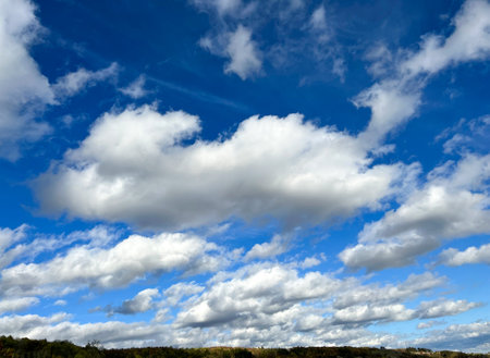 sky, blue sky, blue sky with white clouds, white clouds, sky scenery, azure sky with light clouds, azure skyの写真素材