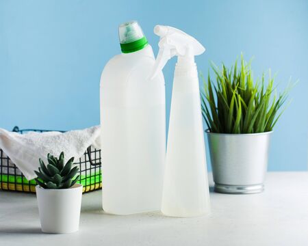 Detergent, disinfectant on a blue background. The concept of cleaning, General cleaning, household chemicals.の写真素材