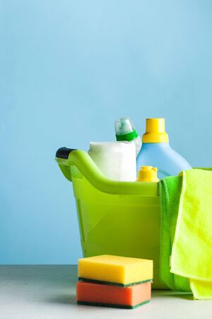 Household chemicals, cleaning sponges, plastic basin. General cleaning, cleaning company concept, cleaning.の写真素材