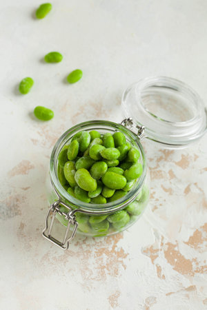Frozen Soy beans in a glass jar. Freezing is a safe method of increasing the shelf life of...