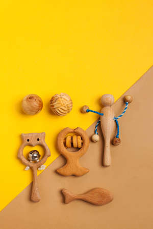 Childrens wooden toys, rattles and teethers. Copy space.の写真素材