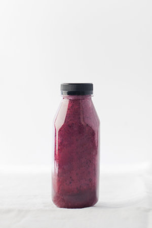Berry smoothie in a bottle. Detox. Copy space.の写真素材