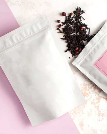 Aluminum berry tea bags with pink label for textの写真素材