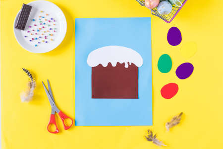 How to make an Easter card. Step-by-step photo instructions. Step 3 glue the cake on colored paper. DIY.の写真素材