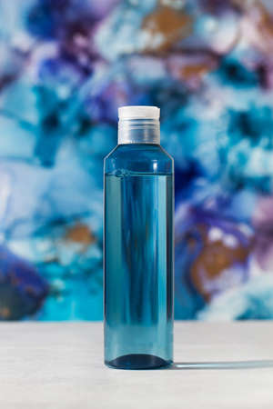Blue cleansing lotion for facial skin care. Layout of a liquid cosmetic product. Beauty concept.の写真素材