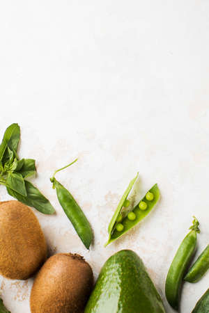 Green fresh vegetables and fruits. Vegetarianism. Copy space.