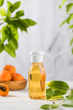 Liquid cosmetic product with apricot extract. Shower gel with apricot.の写真素材