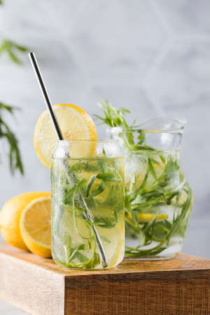 Refreshing homemade lemonade with tarragon and lemon. Summer drinks.の写真素材