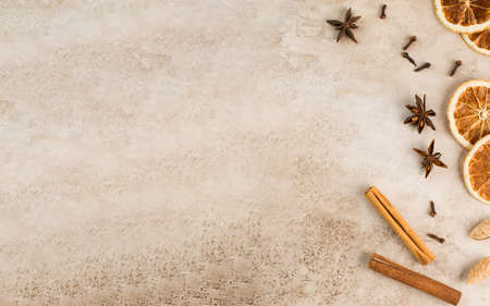 Cinnamon sticks, slices of dried orange, star anise. Top view. Autumn background. The concept of celebrating Christmas.の写真素材