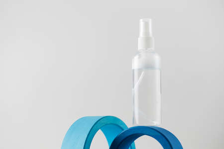 Tonic or facial lotion in a clear plastic bottle on a white background. Daily skin care. Copy space.の写真素材