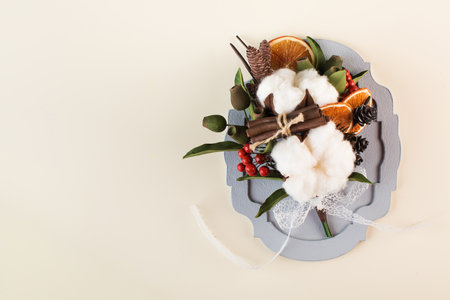 Bouquet with cotton flowers, cinnamon and orange slices made of polymer clay. Interior bouquet.の写真素材