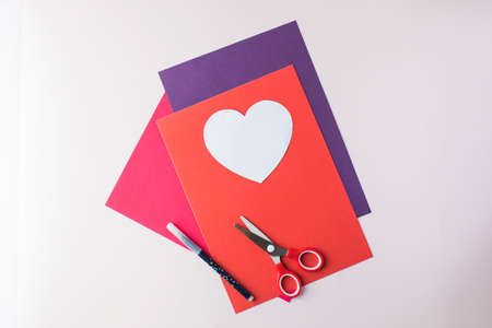 DIY and childrens creativity. Step by step instructions on how to make an owl valentine card with hearts. Step 1の写真素材