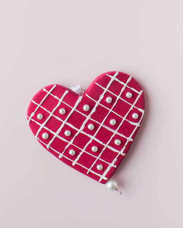 Red heart on colorful pink background Valentines Day holiday greeting cardの写真素材