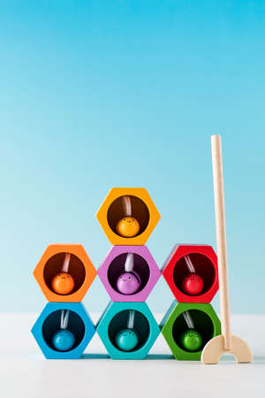 Childrens wooden educational toy bees with beehives. The concept of a Montessori center, a toy...