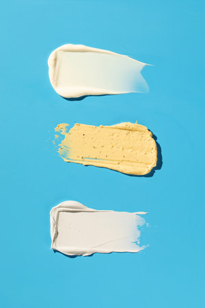 Samples and textures of various cosmetics for skin and hair care. Swatches. Skin care.の写真素材