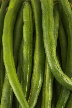 Green beans are raw. Close up. Healthy eating.