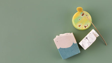 Pieces of different shapes and colors of handmade soap. Natural cosmetics. Copy space