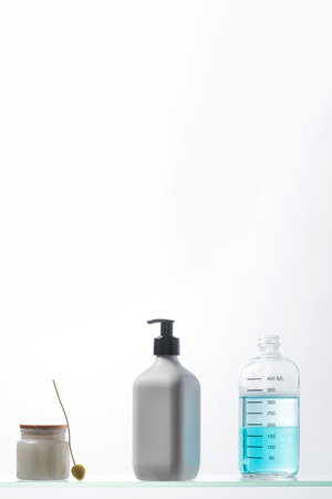 A mockup of a white dispenser with a cosmetic product for skin care of the face and body. Shower gel, facial cleanser.の写真素材