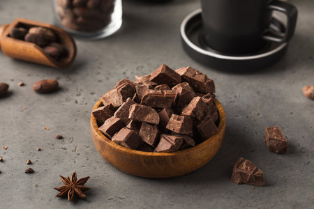 Pieces of natural milk chocolate. Natural products, artisan chocolate.の写真素材