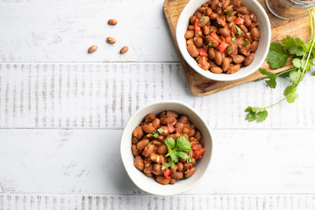 Vegetarian dish of stewed pink beans and tomatoes. A delicious bean dish servedの写真素材