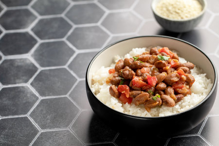 Vegan bean curry with rice and tomatoes. Indian cuisine. Vegetarian dish.の写真素材