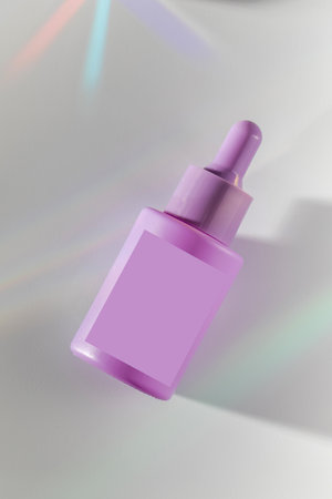 Bright color pipette bottle on light background upper view. Beauty serviceの写真素材