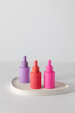 Multi-colored droppers with anti-aging serum for the skin of the face. Skin careの写真素材