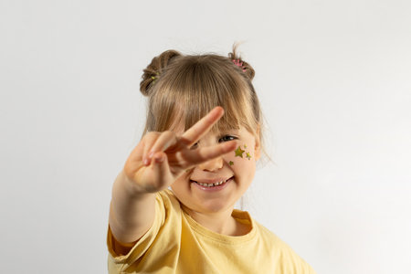 Dreaming smiling boy with stars on face and design templateの写真素材