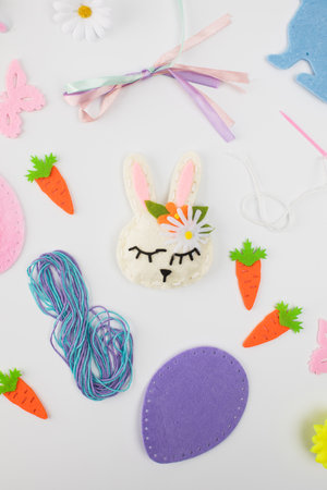 Handmade easter bunny craft with felt and ribbon for diy decoration. Easter giftの写真素材