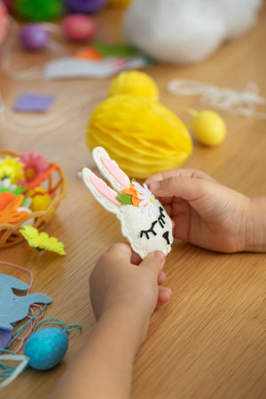 Easter crafting activity with felt bunny and colorful decorations for kids. Easter. DIYの写真素材