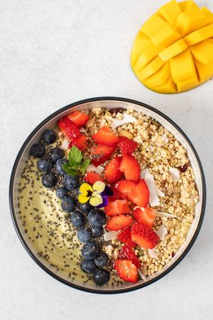Healthy breakfast acai bowl with fresh berries and chia seeds. Smoothie bowlの写真素材