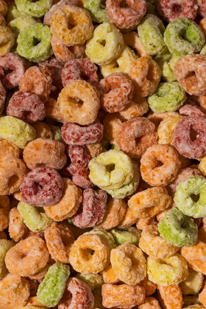 Full frame photo of round multicolored cereals, top view. Breakfast cereal concept.の写真素材