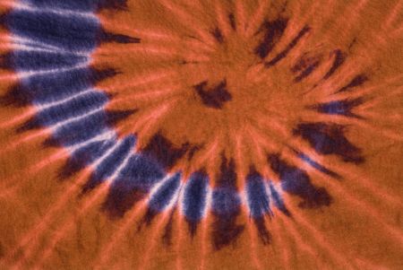 Orange Tie Dye Swirling background pattern