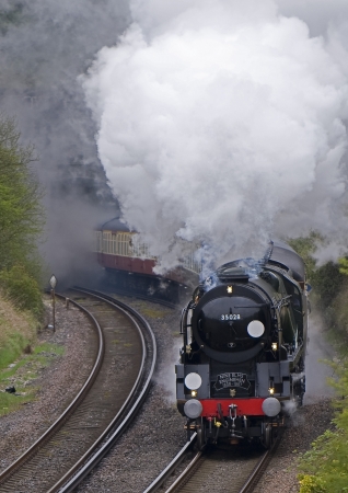 Vintage Steamtrain coming out of tunnelのeditorial素材