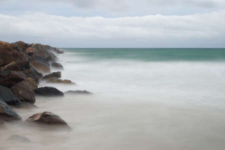 Breakwater on a stormy day.の写真素材