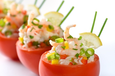Stuffed tomatoes with shrimps and riceの写真素材