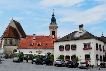 Town hall and church in Rust. Part of town square. Rust is the smallest town Austria placed at Neusiedl lake. Burgenland, Austria.の写真素材