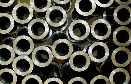 CNC machining as a background. Tourned tubes with steel hole by lathe tourning.の写真素材