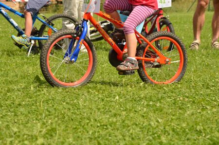Child riding bike raceの写真素材