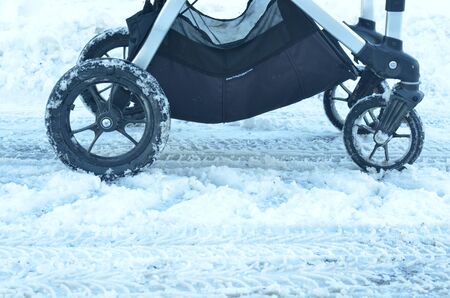 Buggy is riding through the snowy road.の写真素材