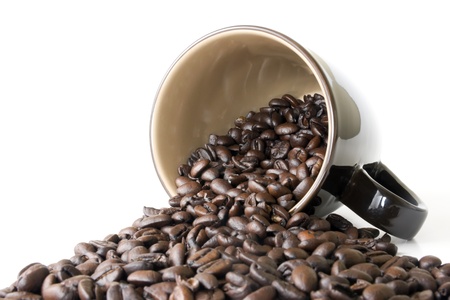 Coffee Cup With Spilled Espresso Beansの写真素材
